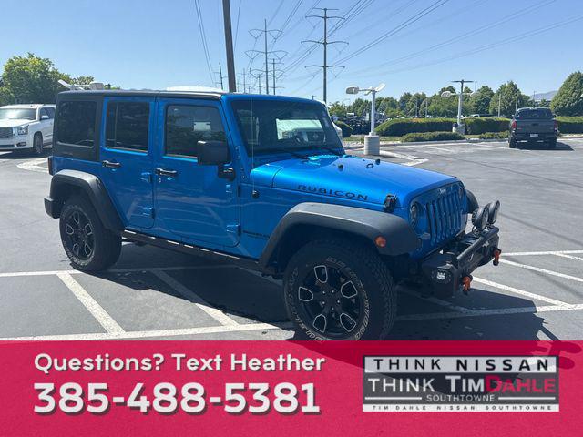 used 2015 Jeep Wrangler Unlimited car, priced at $26,303