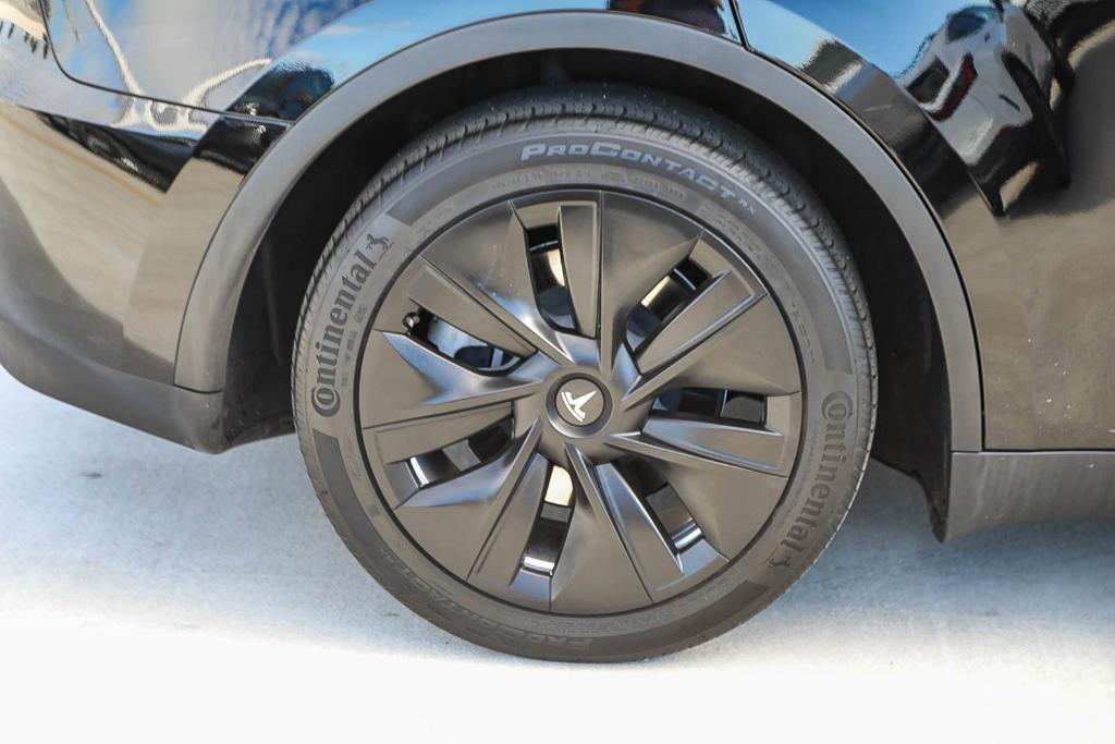 used 2024 Tesla Model Y car, priced at $33,995