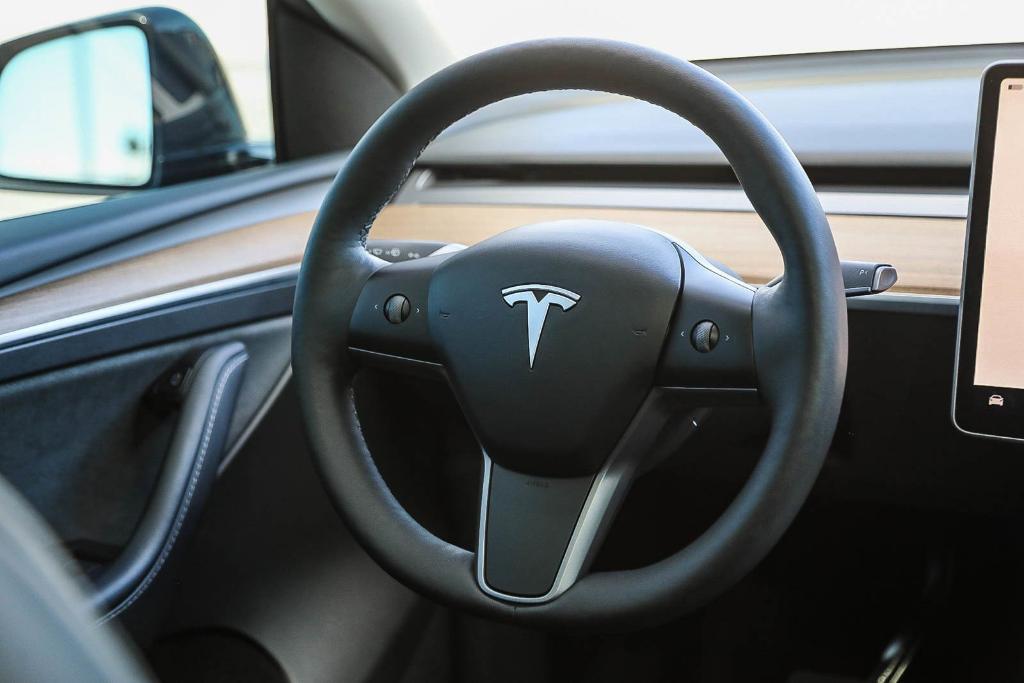 used 2024 Tesla Model Y car, priced at $33,995
