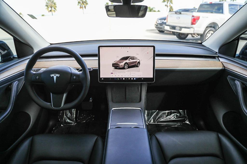 used 2024 Tesla Model Y car, priced at $33,995