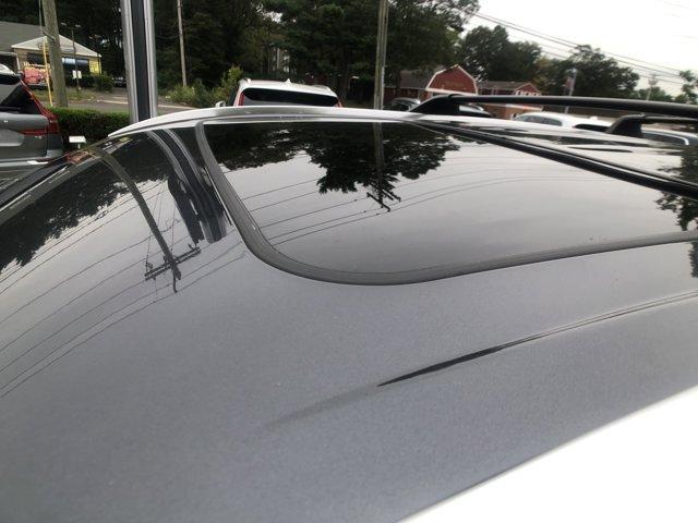 used 2021 Toyota Highlander Hybrid car, priced at $29,395