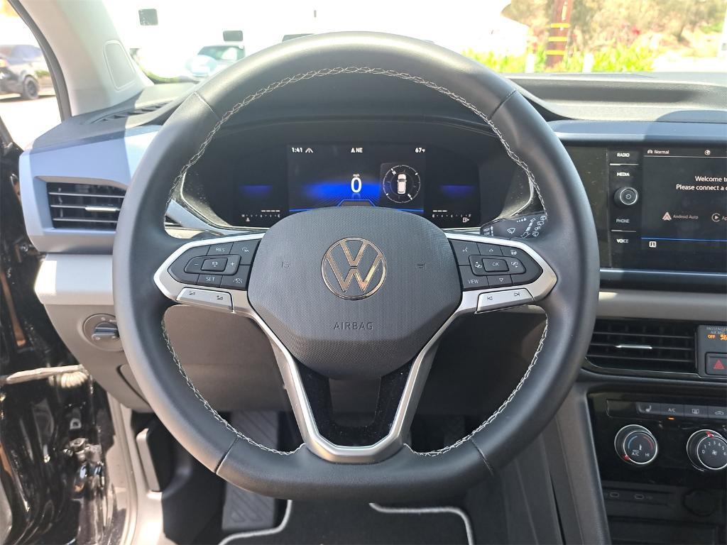 used 2023 Volkswagen Taos car, priced at $27,200