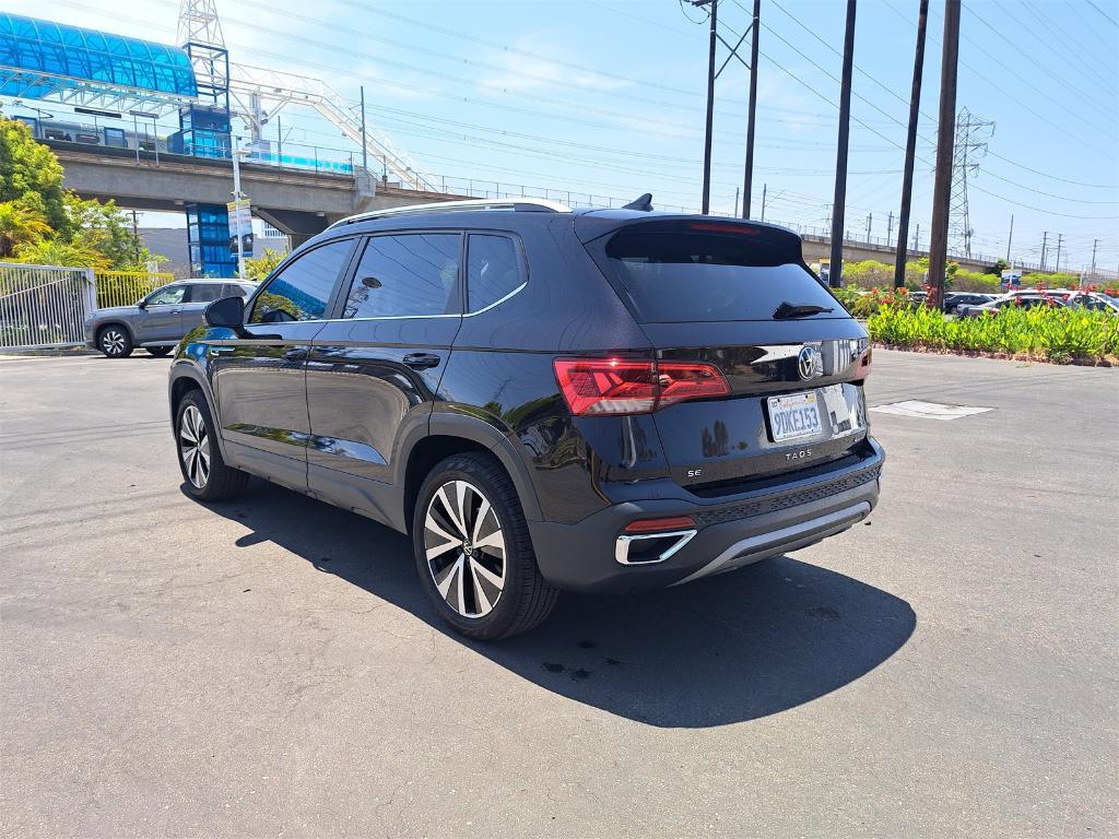 used 2023 Volkswagen Taos car, priced at $27,200