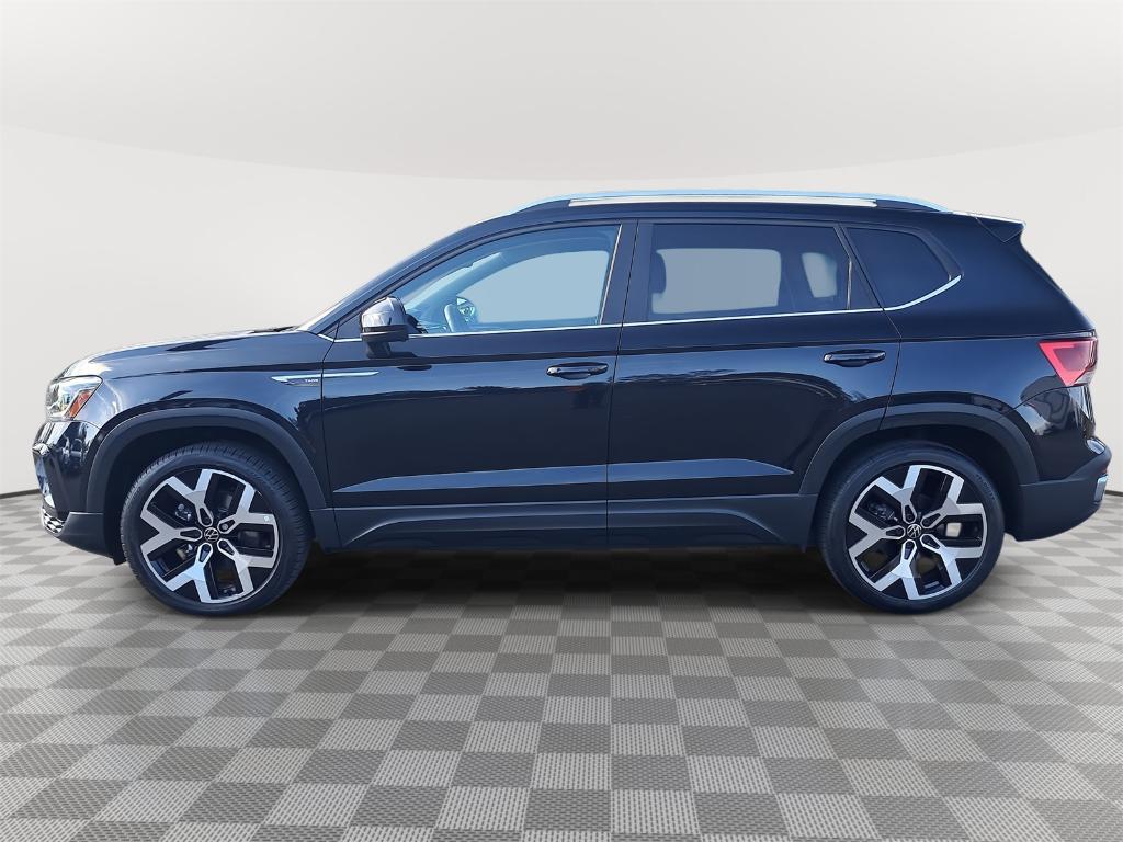 used 2023 Volkswagen Taos car, priced at $21,600
