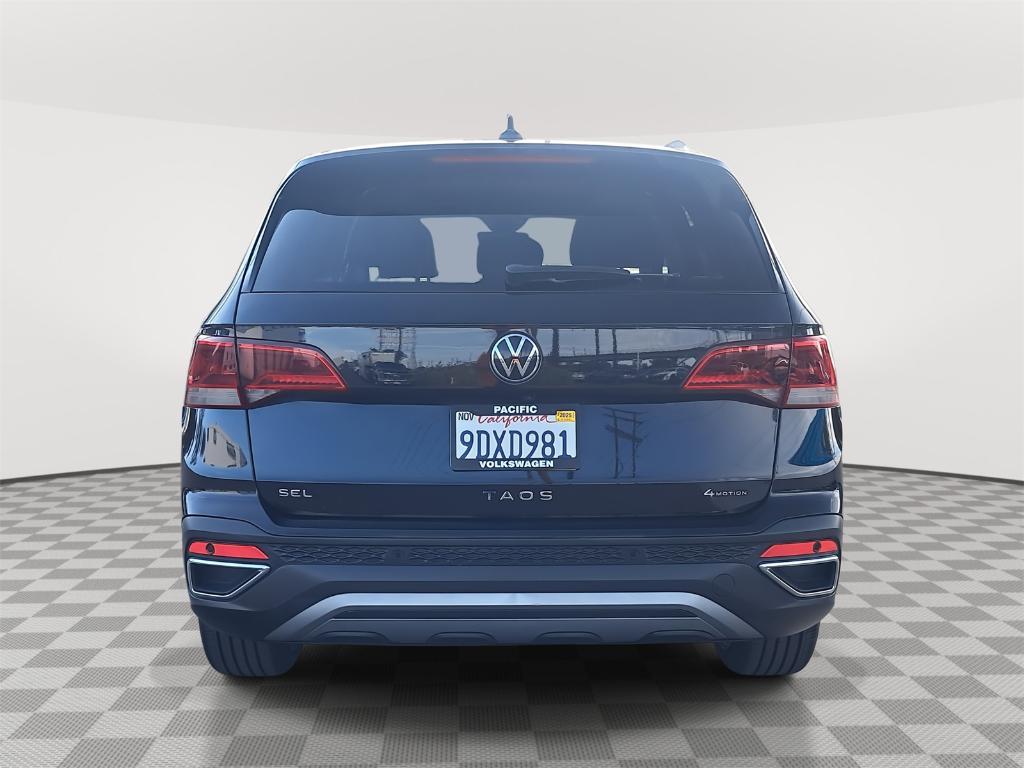used 2023 Volkswagen Taos car, priced at $21,600