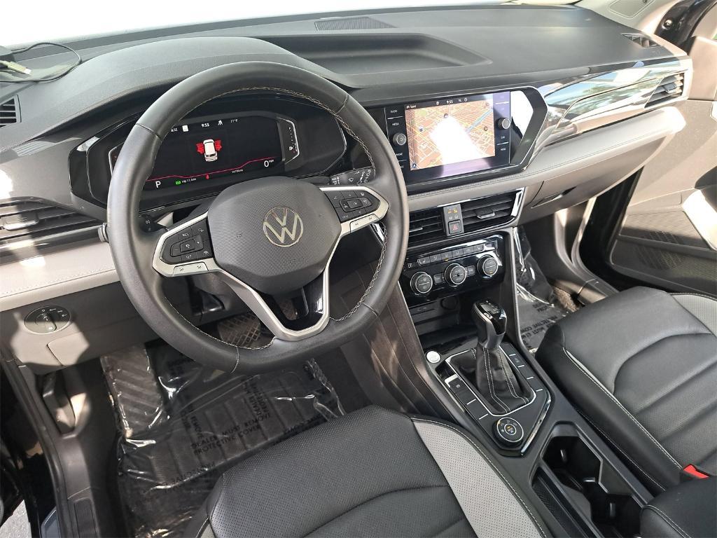 used 2023 Volkswagen Taos car, priced at $21,600