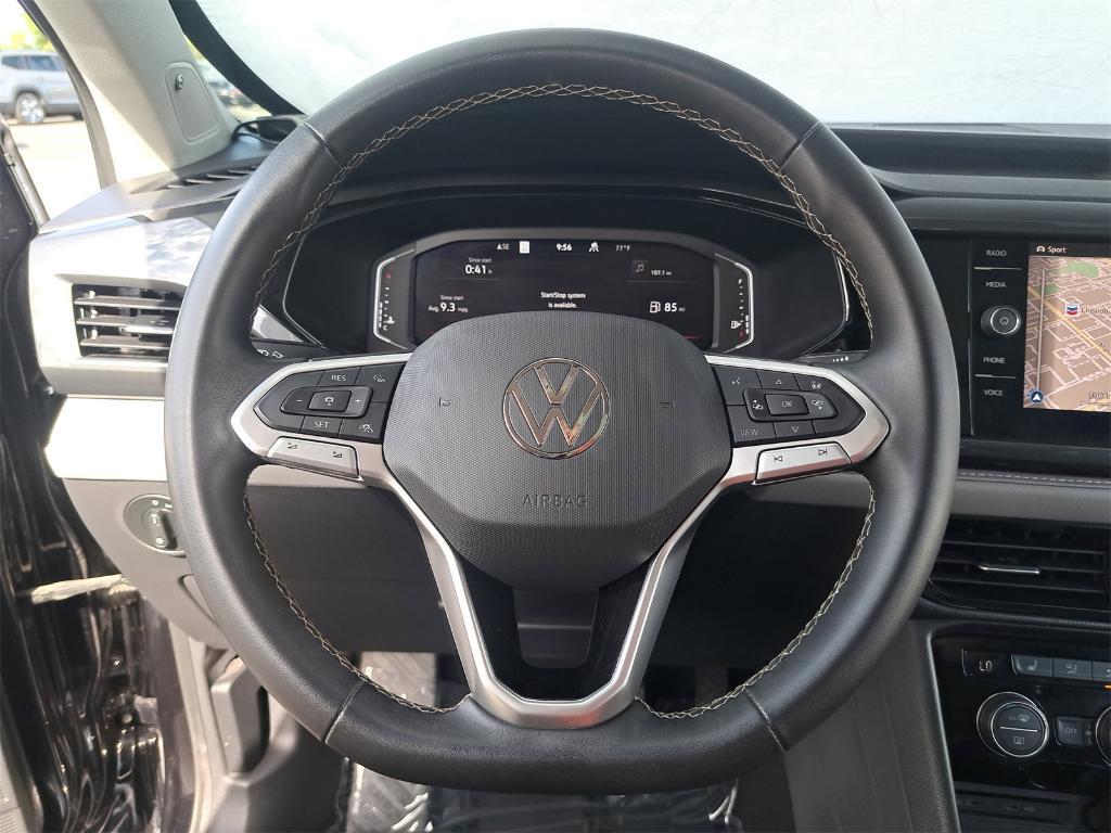used 2023 Volkswagen Taos car, priced at $21,600