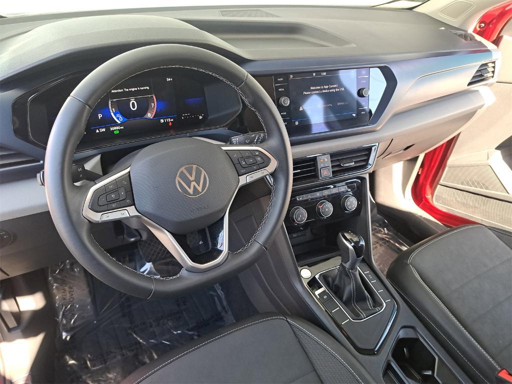 used 2023 Volkswagen Taos car, priced at $19,500