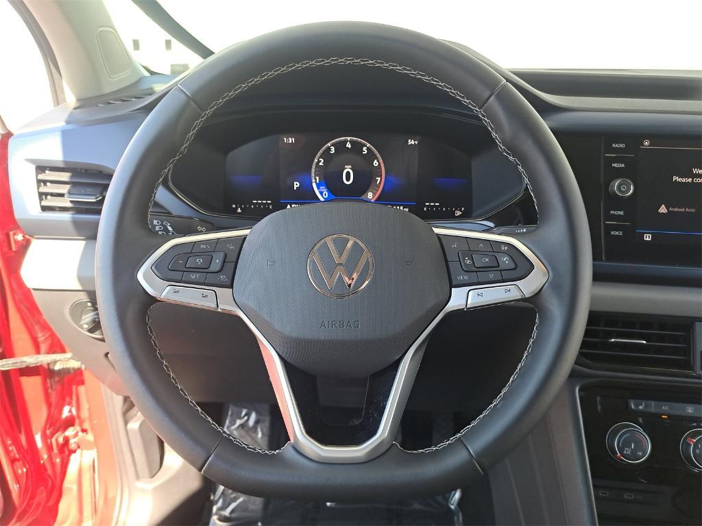used 2023 Volkswagen Taos car, priced at $19,500