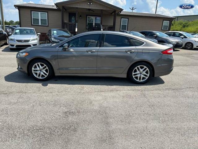 used 2014 Ford Fusion car, priced at $5,249