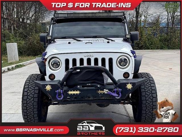 used 2014 Jeep Wrangler Unlimited car, priced at $13,999