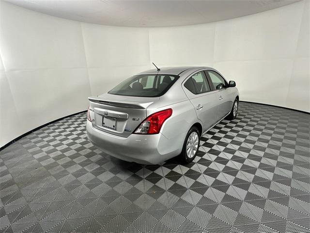 used 2013 Nissan Versa car, priced at $7,998