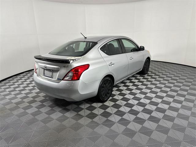 used 2014 Nissan Versa car, priced at $4,998
