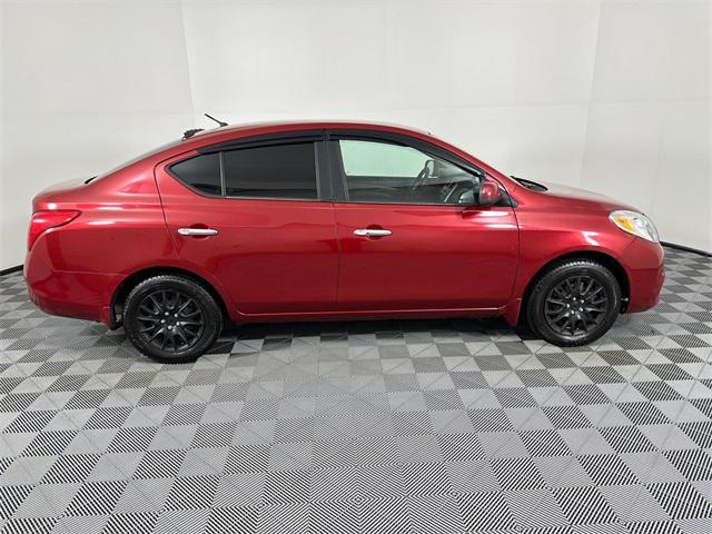 used 2012 Nissan Versa car, priced at $4,998