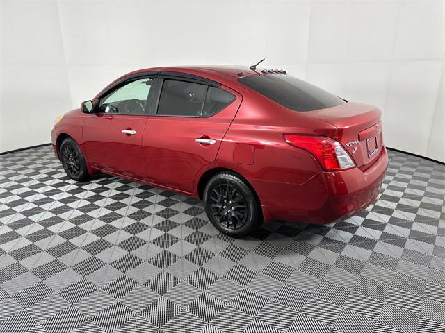 used 2012 Nissan Versa car, priced at $4,998