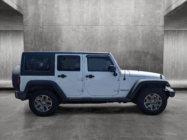 used 2016 Jeep Wrangler Unlimited car, priced at $21,200