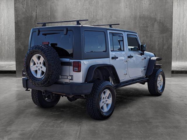 used 2012 Jeep Wrangler Unlimited car, priced at $10,900
