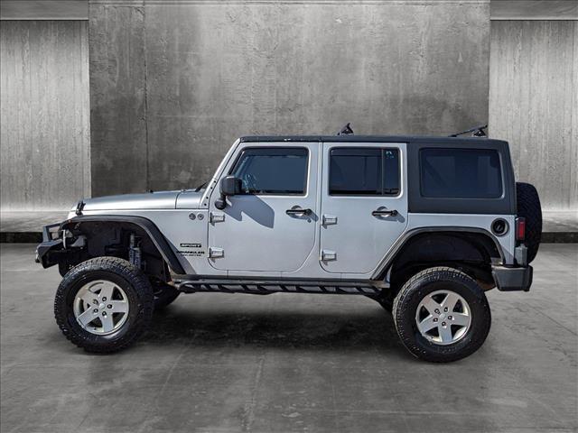 used 2012 Jeep Wrangler Unlimited car, priced at $10,900