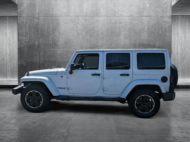 used 2012 Jeep Wrangler Unlimited car, priced at $16,999