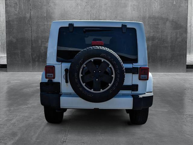 used 2012 Jeep Wrangler Unlimited car, priced at $16,999