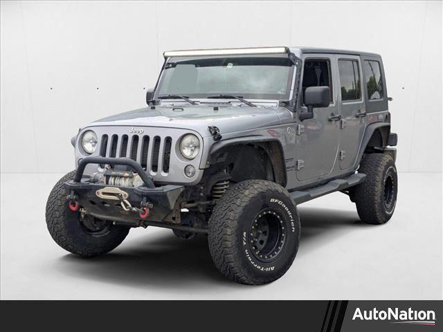 used 2014 Jeep Wrangler Unlimited car, priced at $15,649