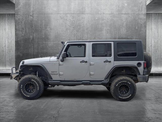 used 2014 Jeep Wrangler Unlimited car, priced at $15,649