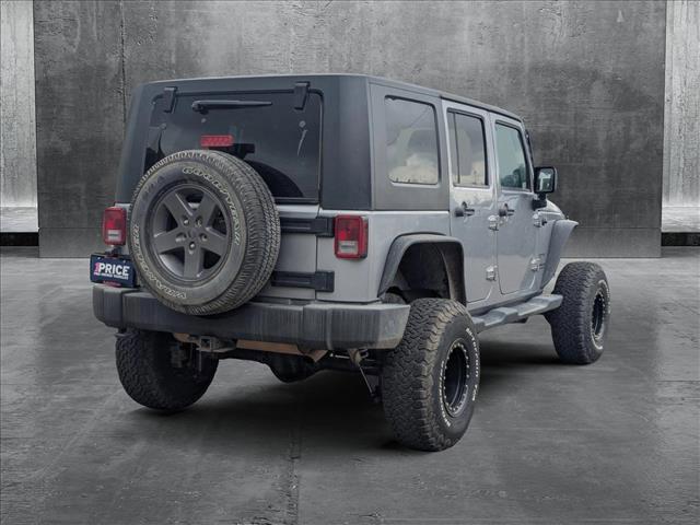 used 2014 Jeep Wrangler Unlimited car, priced at $15,649