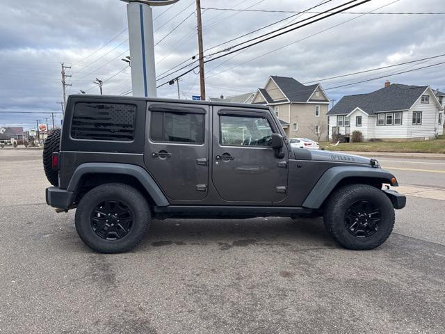 used 2014 Jeep Wrangler Unlimited car, priced at $18,815