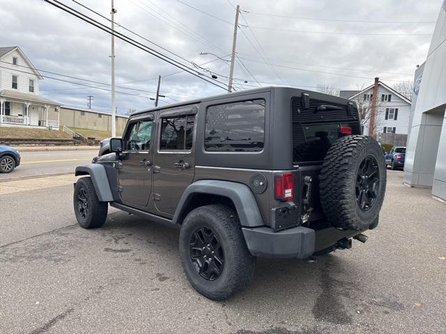 used 2014 Jeep Wrangler Unlimited car, priced at $18,815