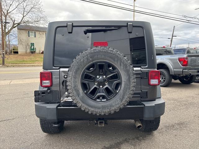 used 2014 Jeep Wrangler Unlimited car, priced at $18,815