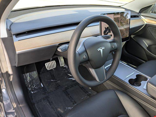 used 2022 Tesla Model 3 car, priced at $33,991