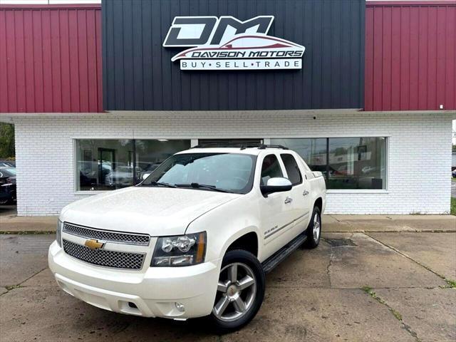 used 2013 Chevrolet Avalanche car, priced at $22,680
