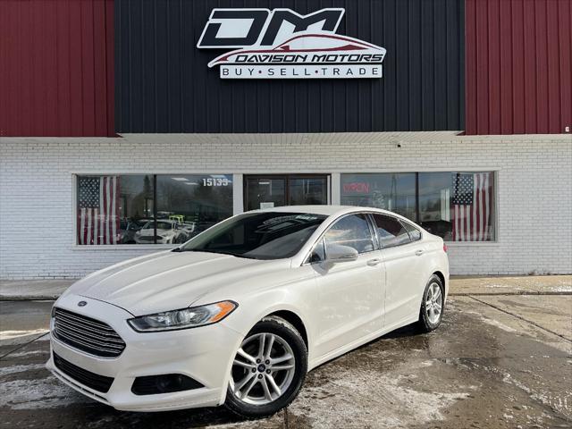 used 2013 Ford Fusion car, priced at $6,495