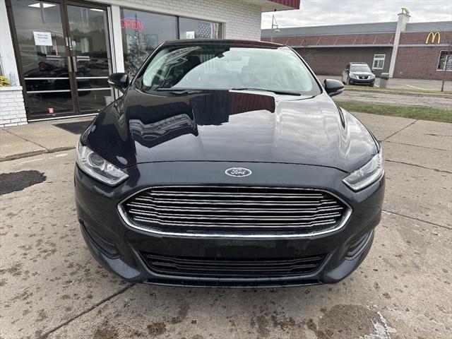 used 2014 Ford Fusion car, priced at $7,895