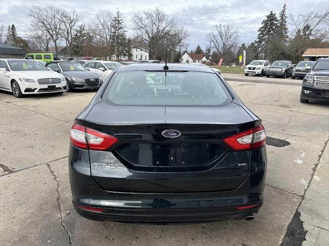 used 2014 Ford Fusion car, priced at $7,895