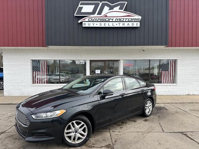 used 2014 Ford Fusion car, priced at $7,895