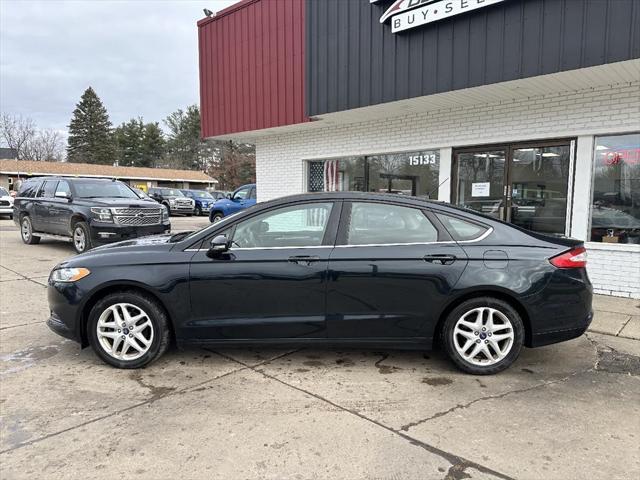 used 2014 Ford Fusion car, priced at $7,895