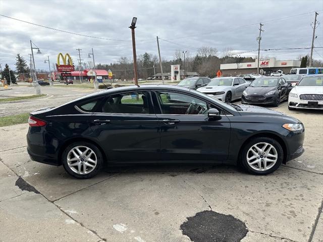 used 2014 Ford Fusion car, priced at $7,895