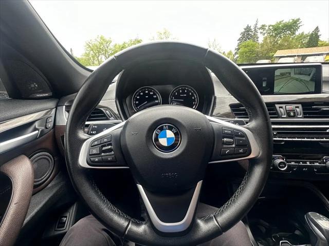 used 2018 BMW X1 car, priced at $19,840