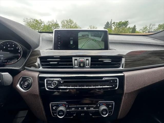used 2018 BMW X1 car, priced at $19,840