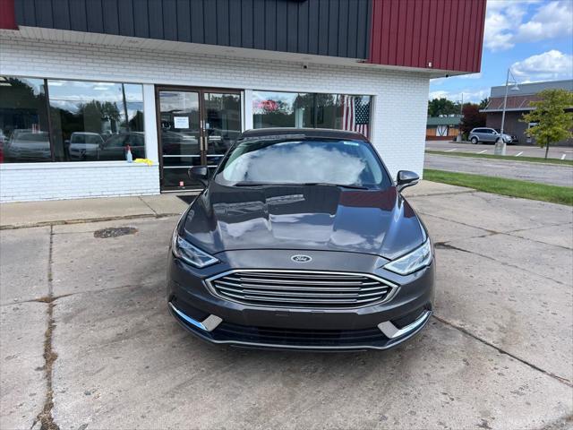 used 2018 Ford Fusion car, priced at $11,488