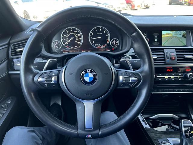 used 2018 BMW X4 car, priced at $23,825
