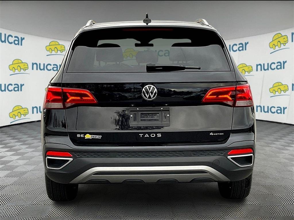 used 2024 Volkswagen Taos car, priced at $24,623