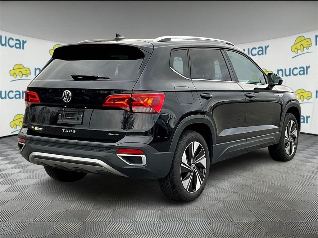 used 2024 Volkswagen Taos car, priced at $24,623