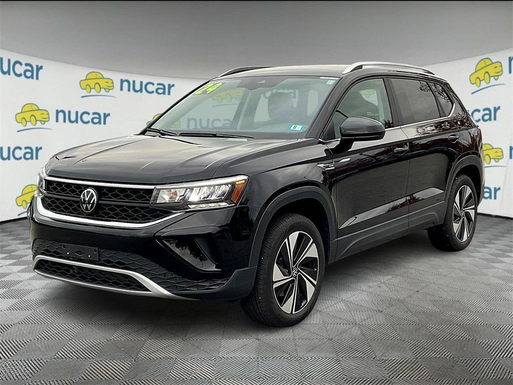 used 2024 Volkswagen Taos car, priced at $24,623