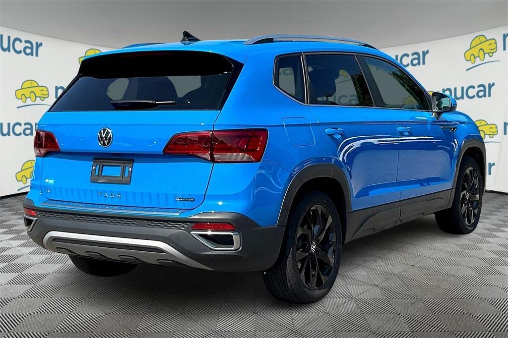 used 2023 Volkswagen Taos car, priced at $22,983