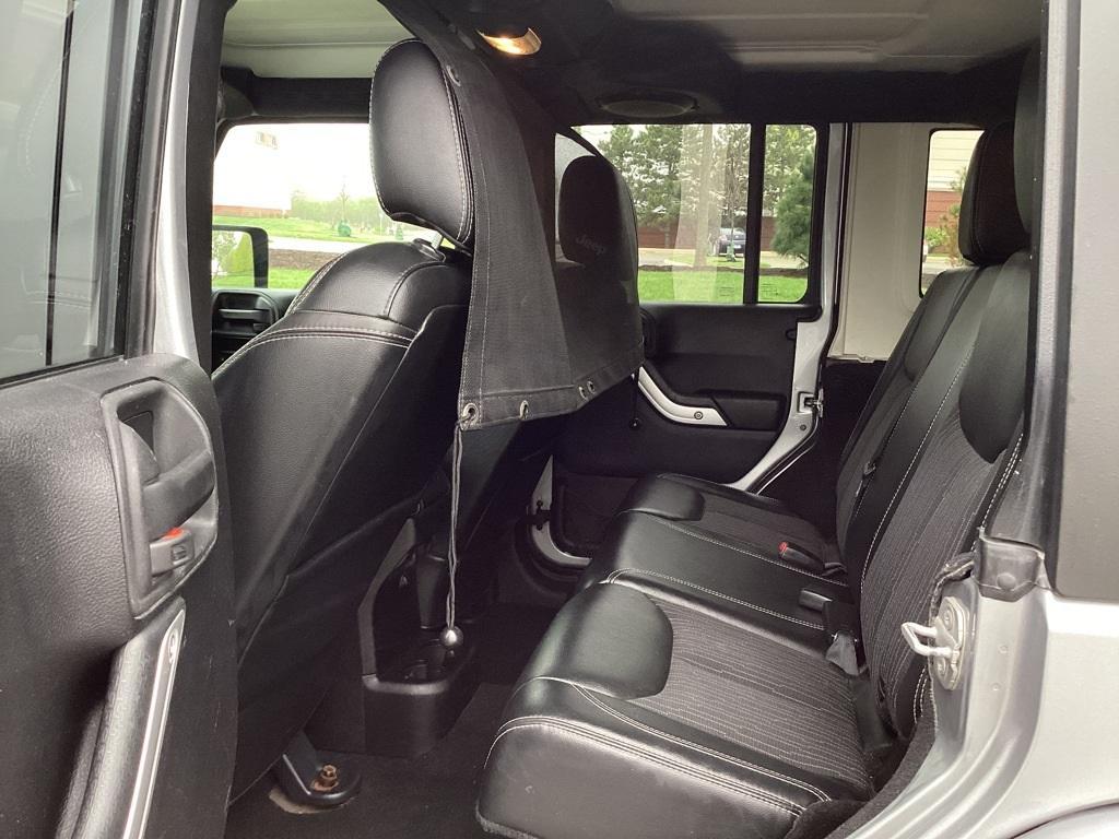 used 2013 Jeep Wrangler Unlimited car, priced at $12,995