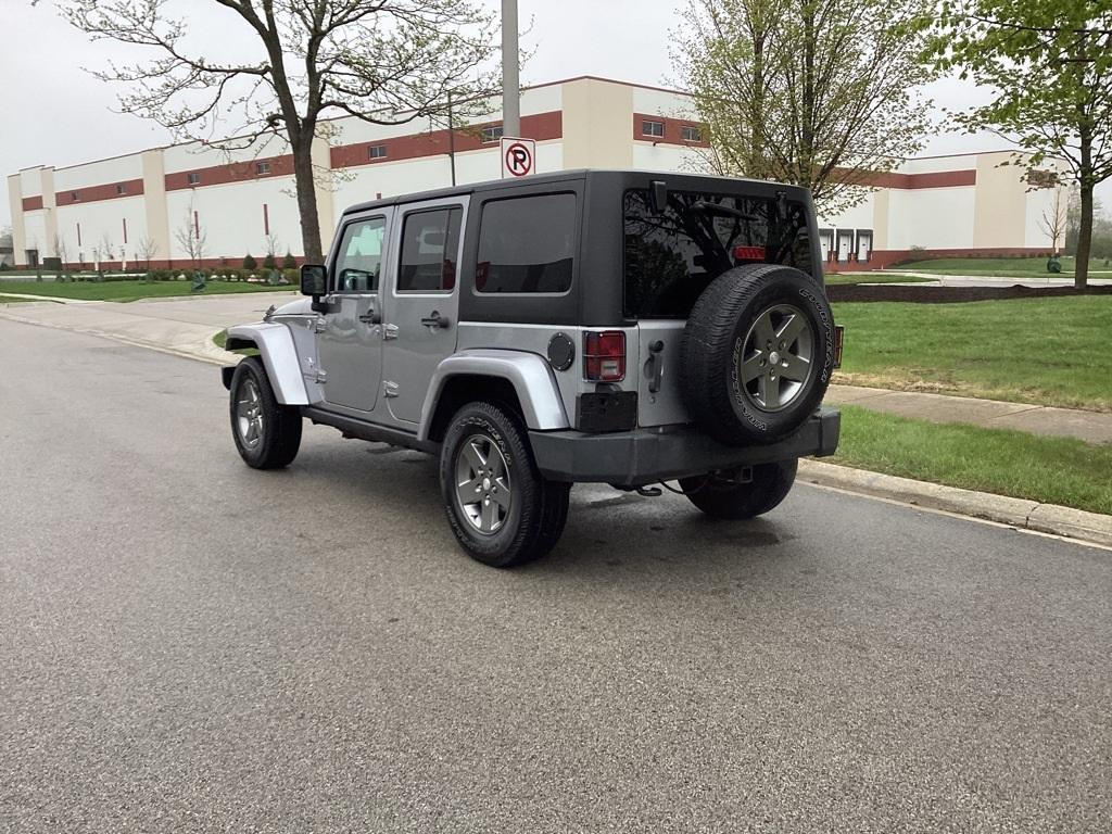 used 2013 Jeep Wrangler Unlimited car, priced at $12,995