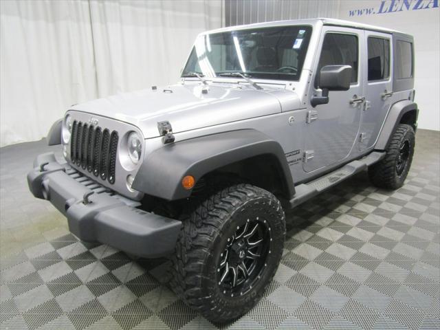 used 2016 Jeep Wrangler Unlimited car, priced at $23,491