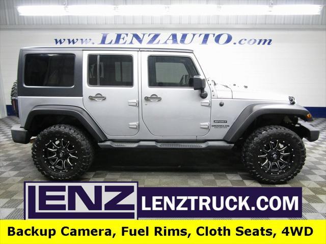 used 2016 Jeep Wrangler Unlimited car, priced at $23,491